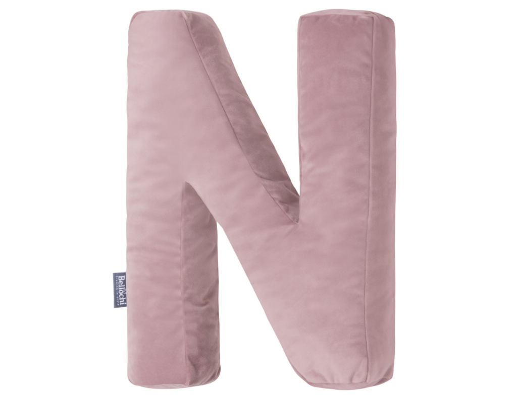 Decorative pillow in the shape of a letter  'N', pink